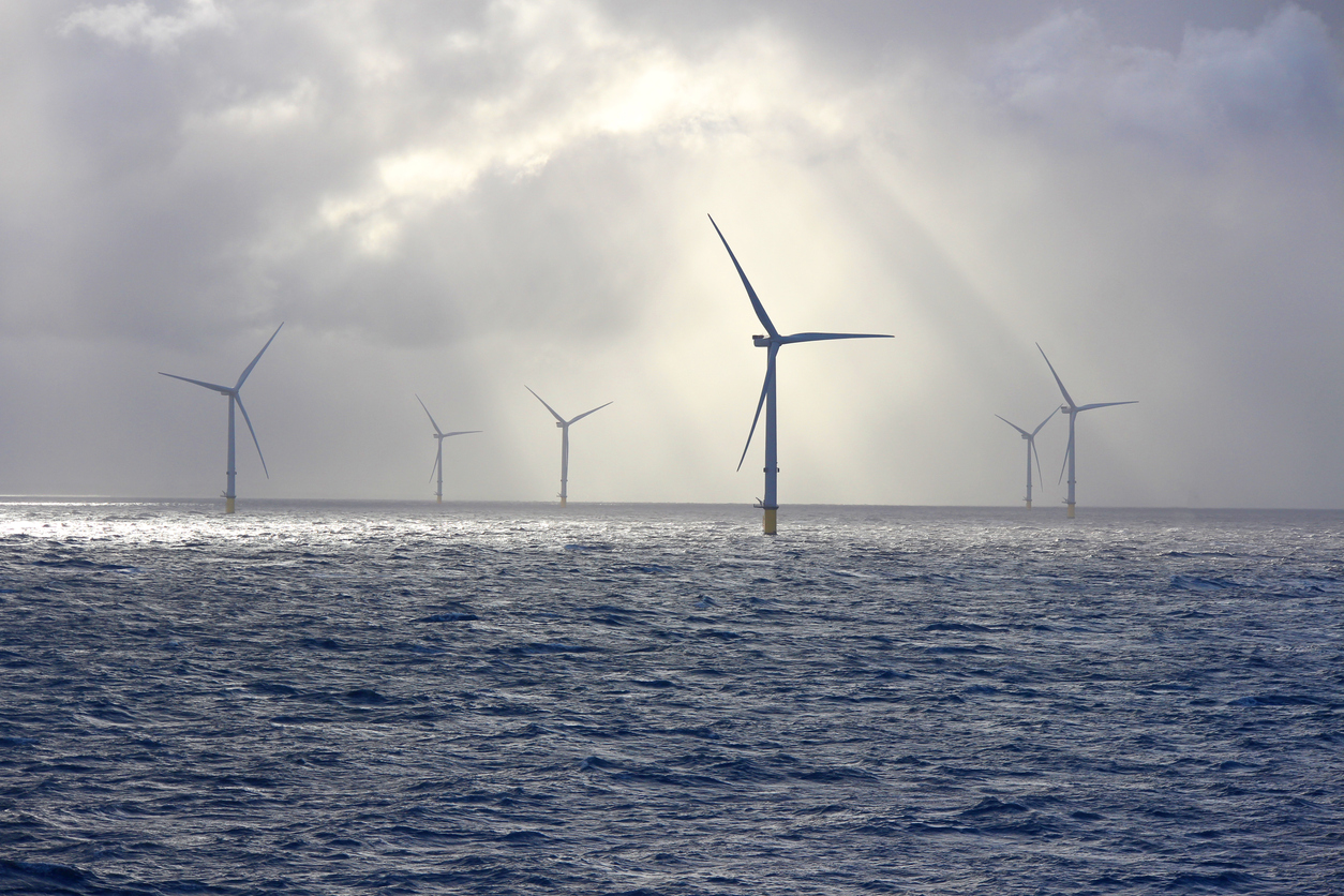Multi-Technology and “Portfolio” PPAs – An Emerging Trend | Zeigo Sustainability Software A group of wind turbines in the ocean